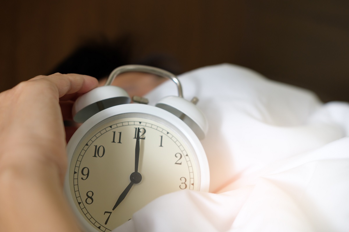 Alarm clock in bed